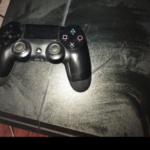 Ps4 with chords and R6Seige disc and a controller
